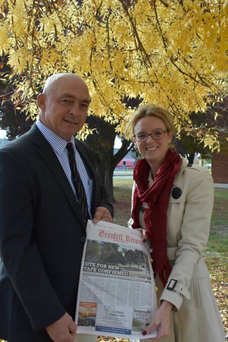 Weddin Mayor Mark Liebich and Member for Cootamundra Steph Cooke proudly display the Grenfell Record front page at the new TAFE CLC site in Grenfell.