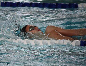 Making a splash: Grenfell's Tom Robinson competes in the 14 years boys' 100m backstroke.  