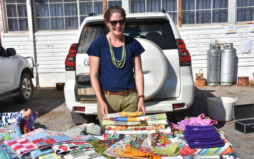 Lorene Hazel with her stall at the Grenfell Dramatic Society's recent Car Boot Sale.