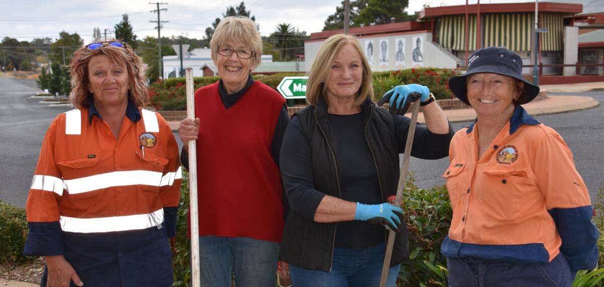 Council garden staff Ruth Higgs (L) and Sharon Eppelstun (R) with Garden Club members Jenny Hetherington and Chris Lobb planting poppy seeds around town.