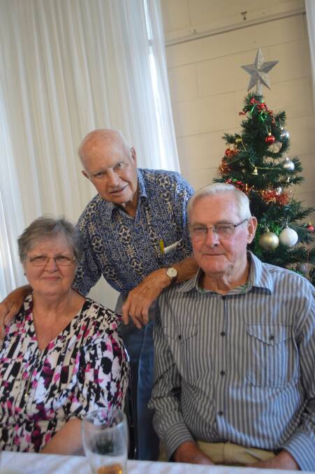 IT'S PARTY TIME: Bill Rudd (M) with Aloha and Arnold Brown at last year's Christmas Party.