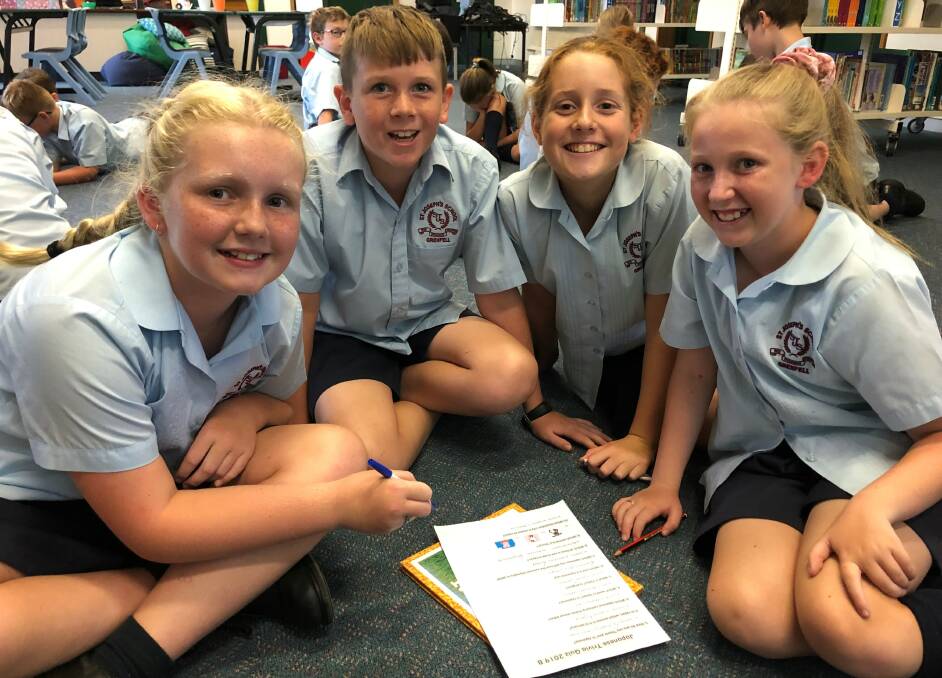 Amelia, Cooper, Xanthe and Annie completing a Japanese quiz. Image supplied 