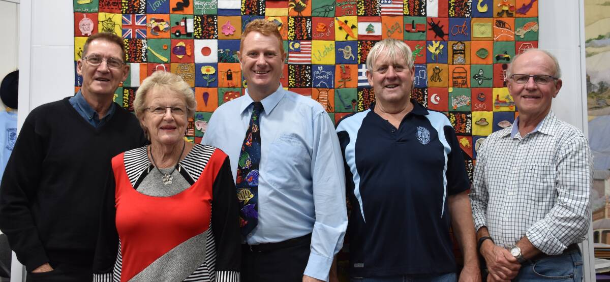 Former teachers Darryl Knapp and Pam Livingstone with Principal Andrew Hooper, staff member John Gorman and Hugh Moffitt.