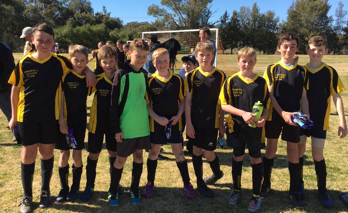 CONGRATULATIONS: Grenfell U12s Wasps - winners of the 2017 junior soccer grand final. Photo Tracey Taylor.