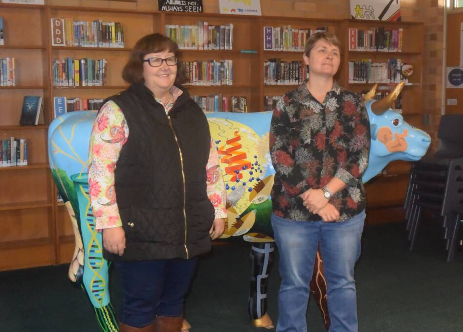 THLHS ag teacher Caroline Baker and art teacher Jillian Reidy answer questions from the judges during the presentation of this year's Archibull Prize entry (see story page on page 1 of today's Record).