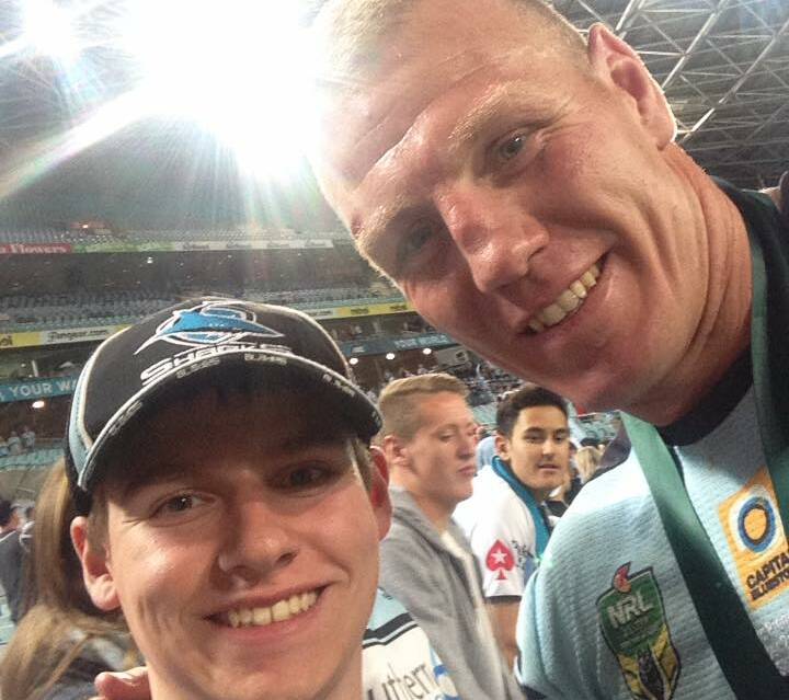 James Seymour with the Clive Churchill medallist Luke Lewis, following the Sharks' win at the League Grandfinal (Contributed)




