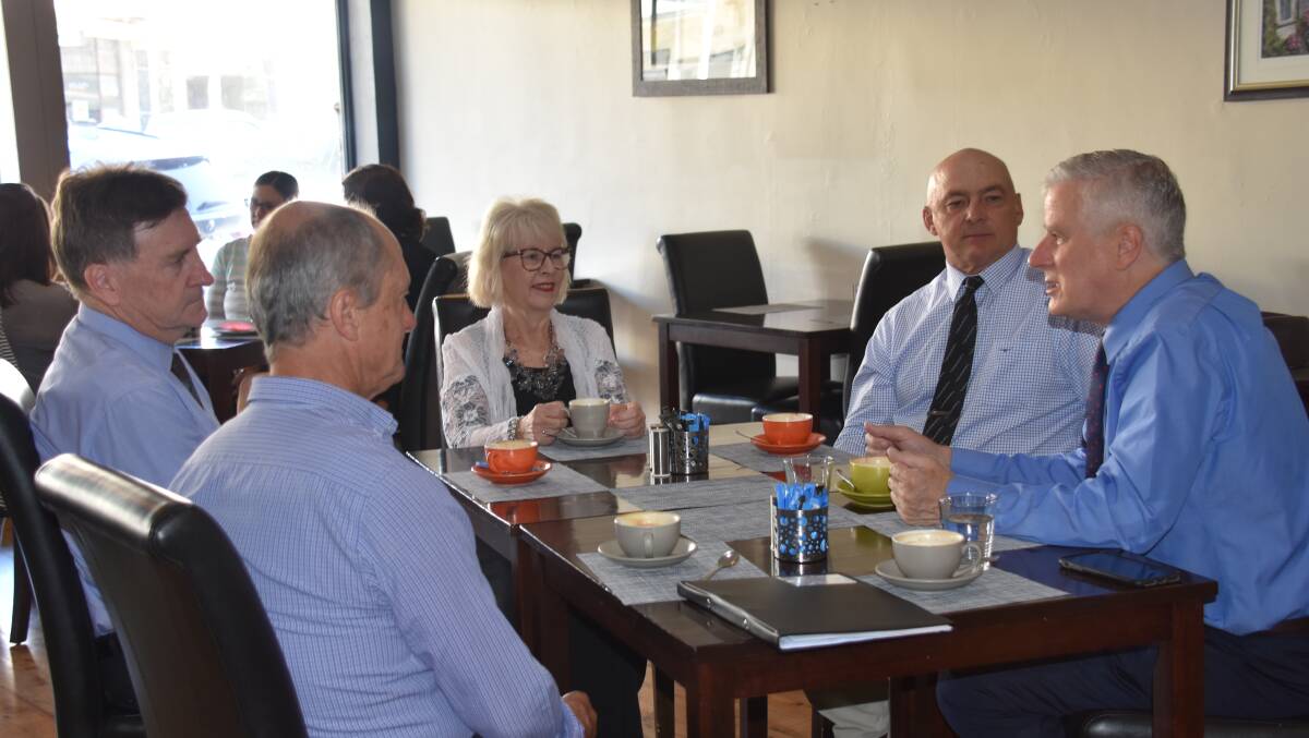 Acting Prime Minister Michael McCormack with Weddin Shire Councillors Phil Diprose and Jan Parlett, mayor Mark Liebich and general manager Glenn Carroll at Unwind Cafe. 