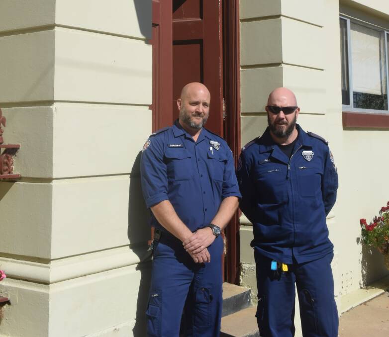 Grenfell Ambulance Paramedics Luke Kenna and Paul Westman outside the current station in Main Street have welcomed the announcement that Grenfell will receive a brand new purpose built NSW Ambulance Station.