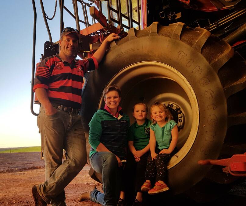 THE HENRY LAWSON HIGH SCHOOL: Where are they now? Mitch and Karen Pollock on the farm with their two children. Photo supplied 