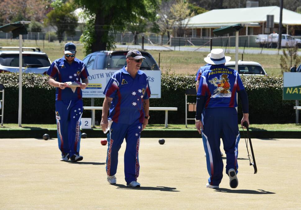 LAWN BOWLS: Grenfell bowlers change ends during a recent championship match. 