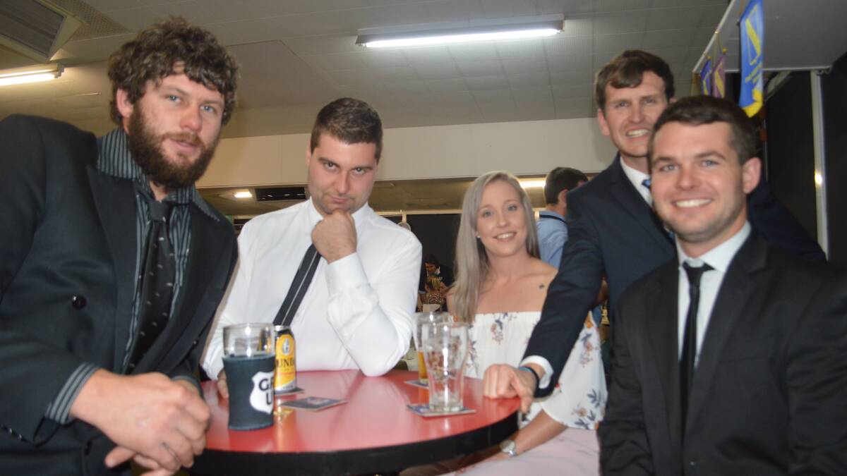 Jake Taylor, Adam Troy, Amber Atkins, James McClelland and Rhys Reid at the anniversary dinner.
