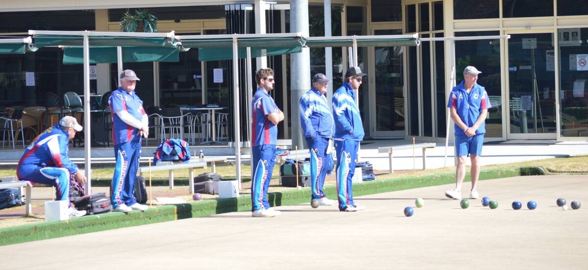 Grenfell bowlers practising on the greens.