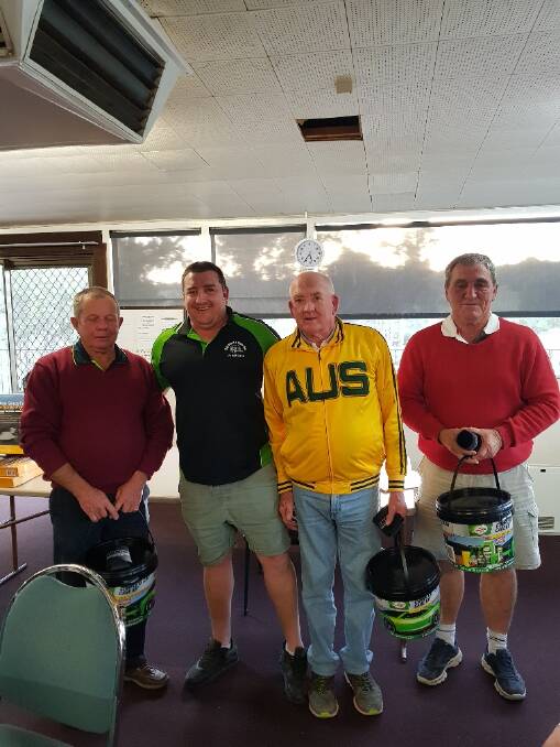 In second place were  Allan Jones, John Grant and Brian Brown pictured with Doug Kohnan recieving their prizes. Image supplied