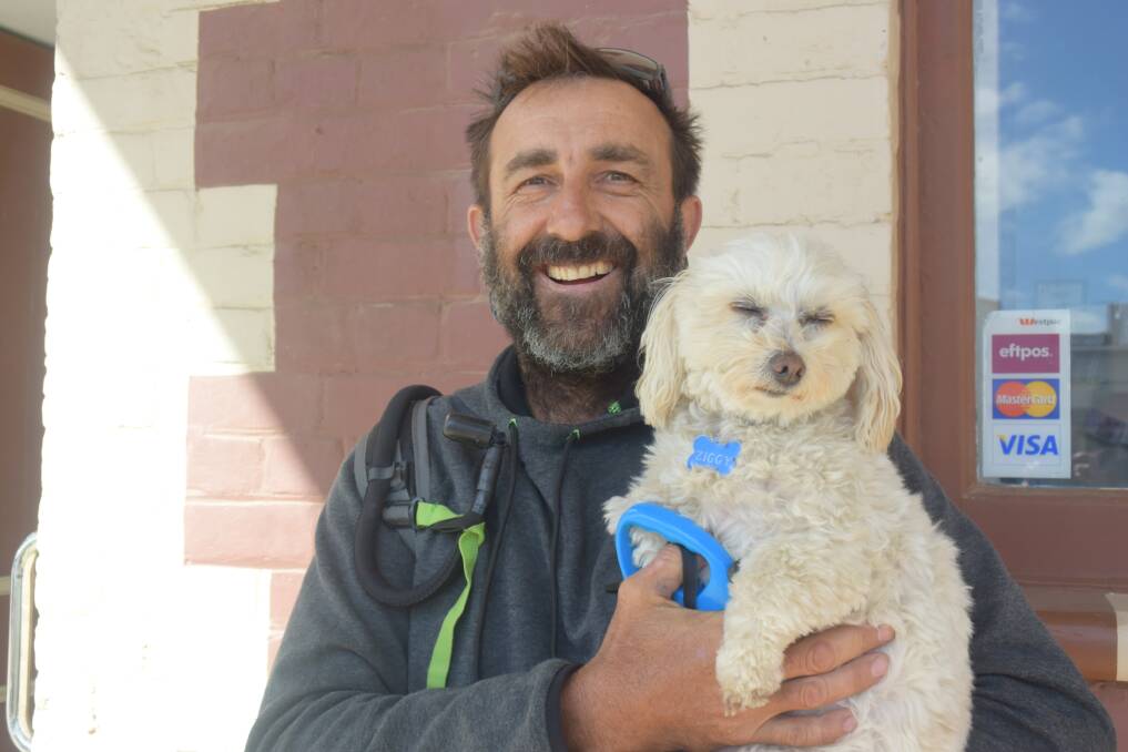 Craig Slater and his faithful companion Ziggy take a short break before continuing their journey. Visit walkagainst.com for details.