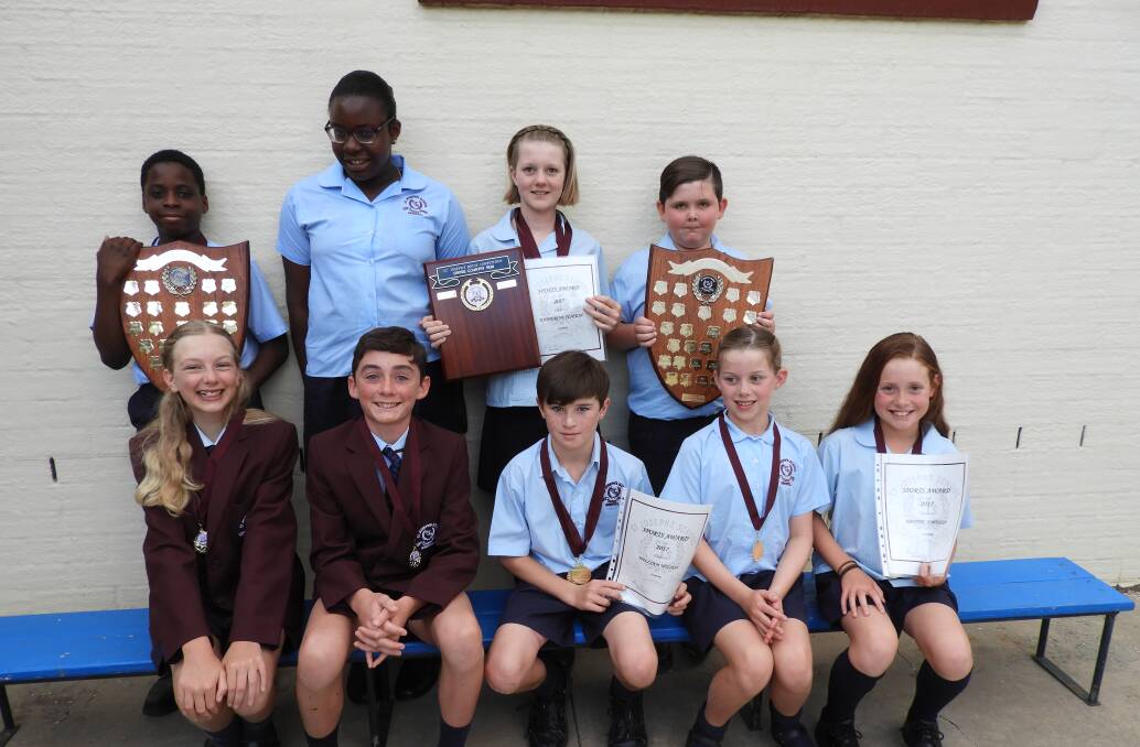  House Captains with sports awards and 2017 sports champions.  

 