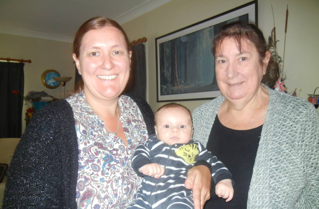 Bianca and Irene Carroll with baby Hunter.  
 