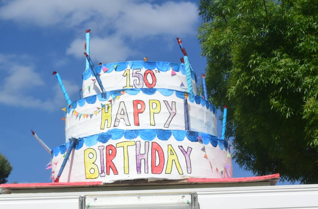 This giant birthday cake was erected at the school's entrance in Warraderry Street.