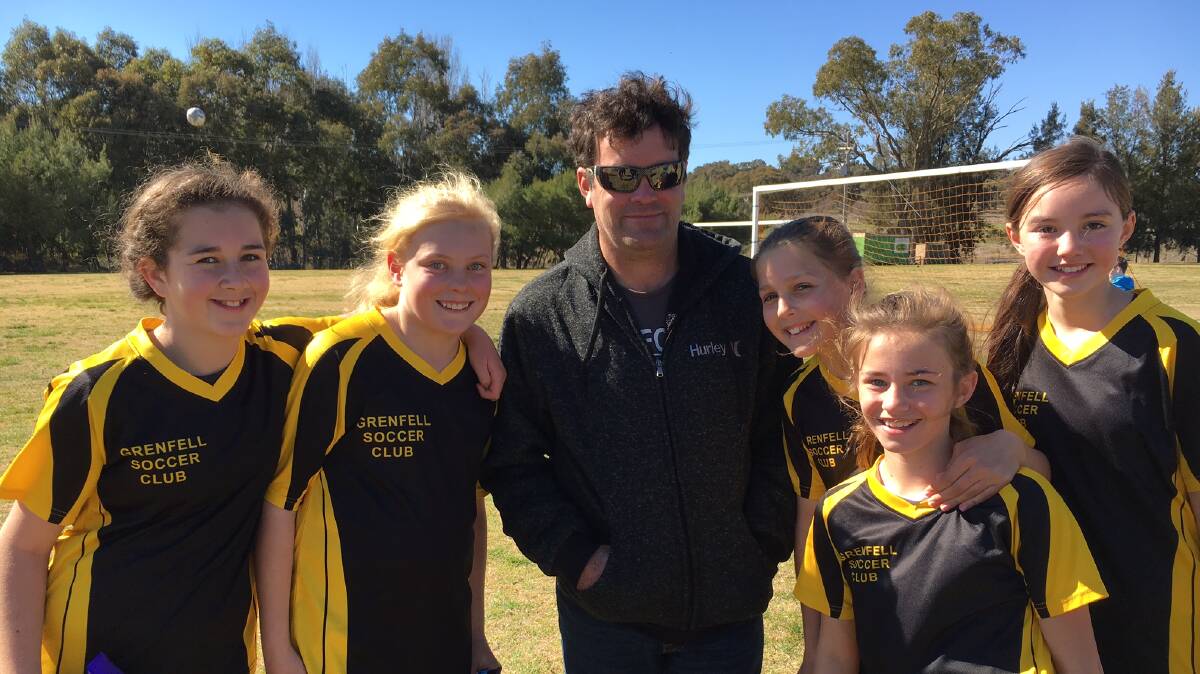Members of the Grenfell U12s Wasps with coach Ross Brenner. Photo Tracey Taylor.