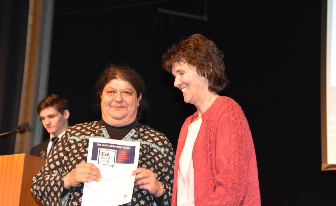 THLHS librarian Margaret Lynch receiving a special award from P&C president Beth Knight.
