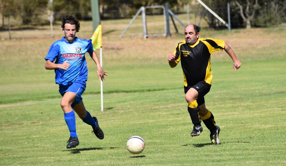 Grenfell Stinger Mitchell Wheatley (R) during last weekend's home game against Parkes Wanderers.