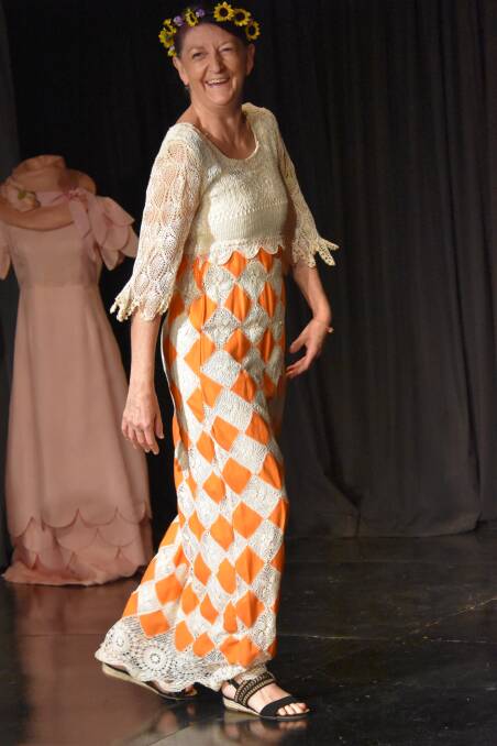 Michelle Rohan models a vintage gown at the GDS fashion parade.