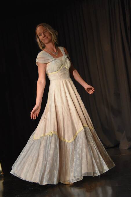 Grenfell Dramatic Society Festival Queen entrant Kelly Luthje models a vintage gown at the Fashion Parade. 