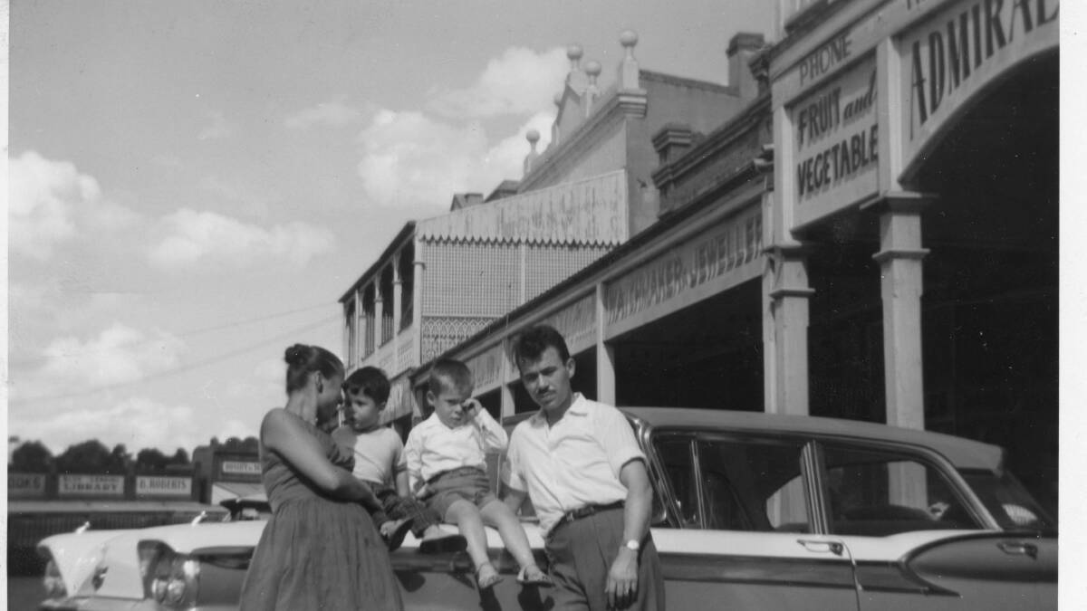  A young Peter Parashos with his father Theo, his Aunt Effie and cousin Steve outside the Admiral Café, around 1960.

