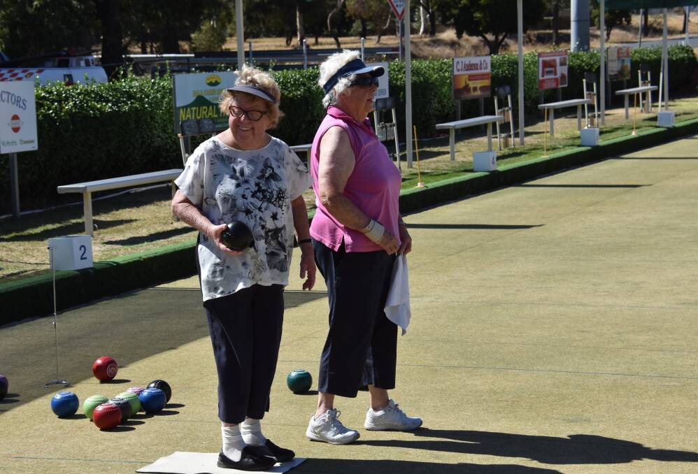 Julie Wood and Joy Murray enjoy a friendly game of social bowls last Saturday Morning, April 7.