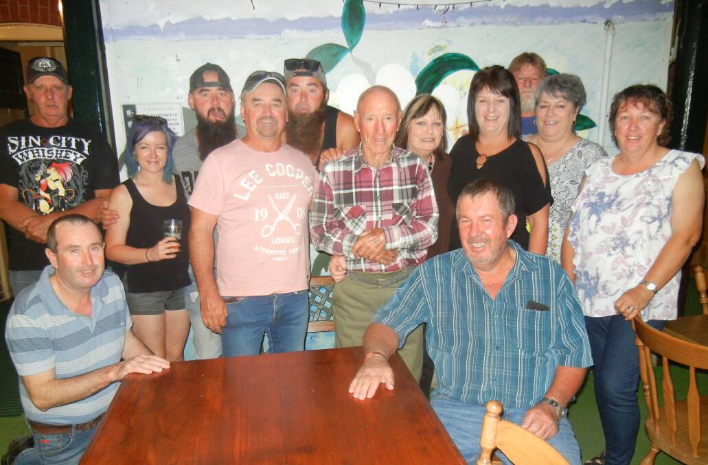 (F-C) Clem Wood with his family and friends celebrating his 85th birthday. 