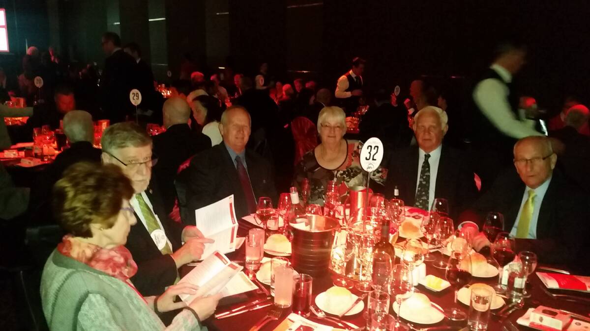 Grenfell Rotary President Ross Craven and Ron and Jan McLelland (centre of photo) at the Awards Night at Bankstown where Bill Atchison was one of four finalists in the NSW Emergency Services Community Awards 2018, run by NSW & ACT Rotary Districts and Clubs. Contributed. 
