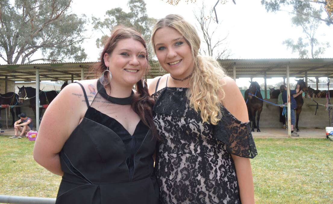 Sisters Hayley and Kylie Lindsay at the 2017 Jockey Club sesquicentenary race day.