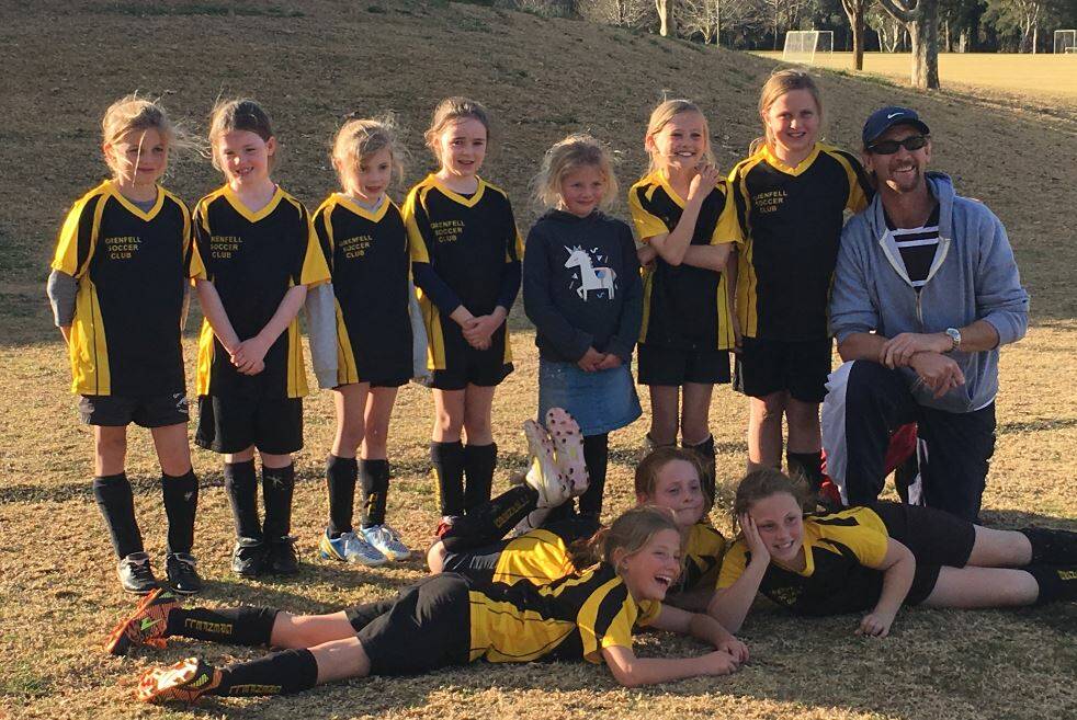The Grenfell girls soccer team that competed at the Cowra gala day last weekend with coach Gavin Johnson.  Photo T Taylor
