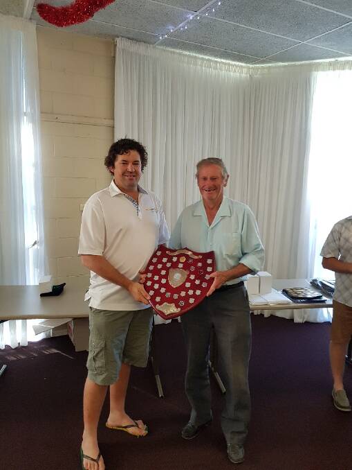 The Fanning Family trophy was awarded to Brain Hughes (R). Photo M Neill