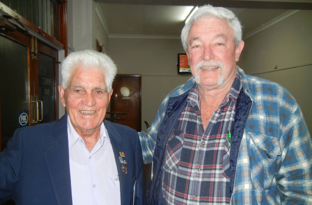 Terry Carroll and Bruce Moll catching up at Canowindra.