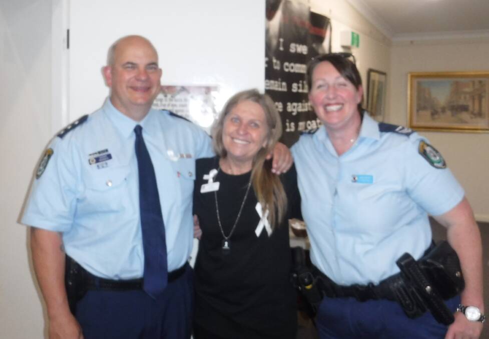 Elly Schiller (M) with Sergeant Michael Madgwick and DV Officer Rennai Cantwell. Image supplied