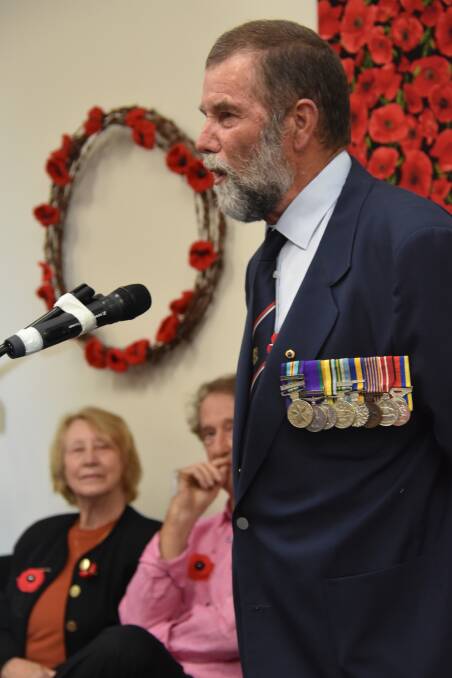 Grenfell RSL member Keith Englesman addresses the crowd at the opening of the Poppy Project exhibition. 