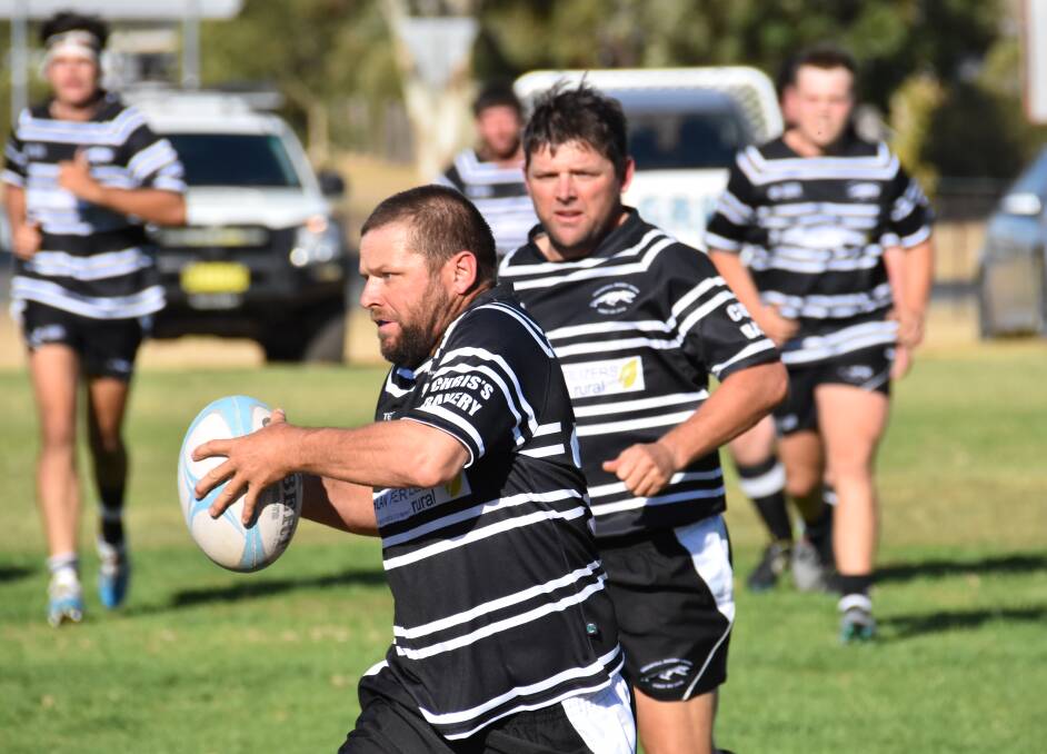 The Hughes brothers desperately try to get points on the board for the Panthers in last weekend's clash against the Harden Red Devils at Bembrick Field.