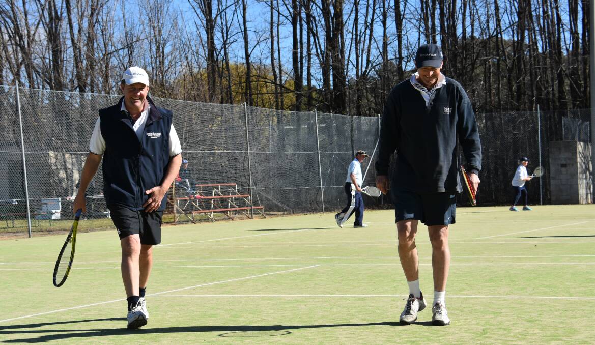 Grenfell Tennis players Danny Joyce and Michael Mitton takes a break during the recent Intertown tennis competition held in Grenfell. 