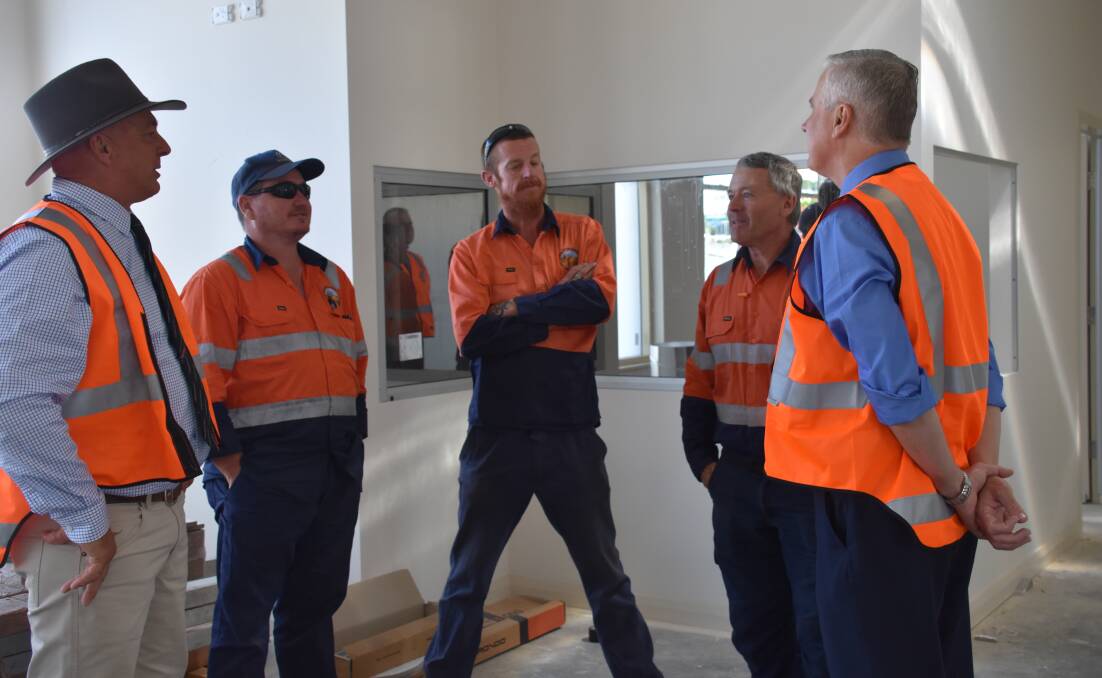 Acting Prime Minister Michael McCormack and Weddin Shire mayor Mark Liebich chat with shire staff on site. 
