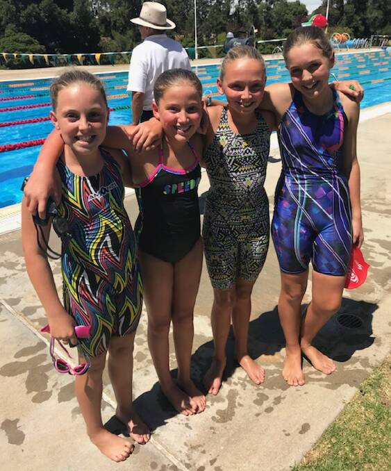 Sophie Berry, Sophie Hughes, Mikayla Hughes and Annabella Taylor at the district swimming carnival in Cowra. 