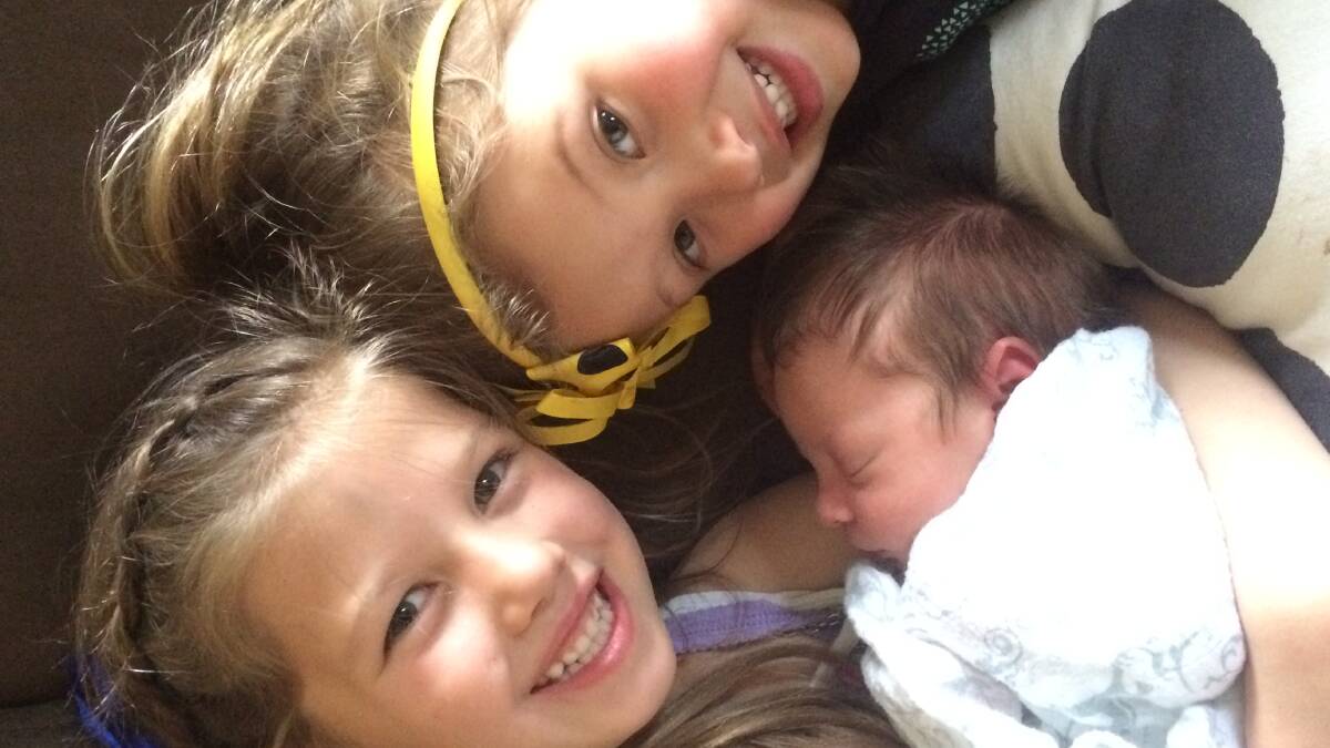Newborn Riley Louise Martin with her two beautiful big sisters Maddison and Penny. (Contributed)

