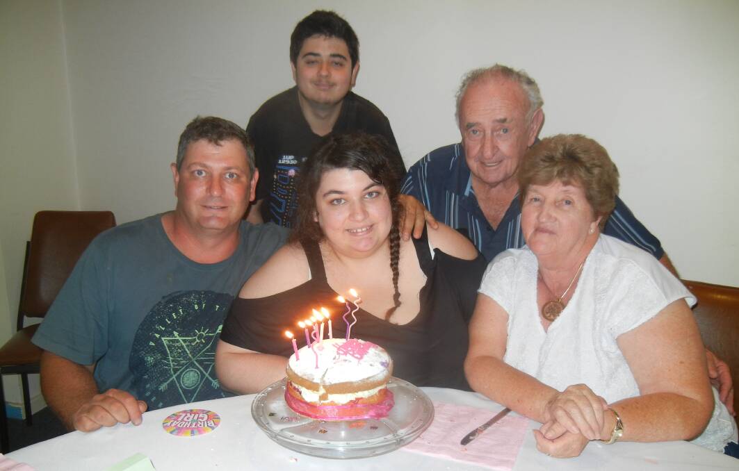 Katrina Hewitt (C) with her dad Mark, brother Brad and grandparents Brad and Janet Hewitt.