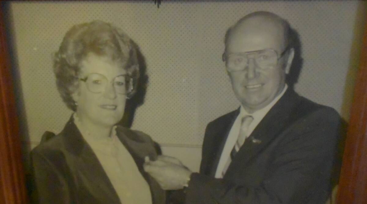 Max Barr presents Robyn with her Grenfell Country Club Life Membership pin on May 21, 1984.