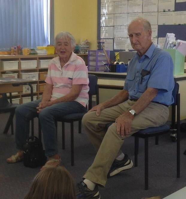 Greenethorpe residents Patti and Jack Chapple talk to the children about what the school was like more than 70 years ago. Photo GPS.