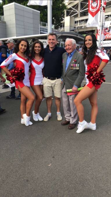 Jack Grant and his grandson Matthew in their glory with the St George Cheer Girls on ANZAC Day. (Contributed)
