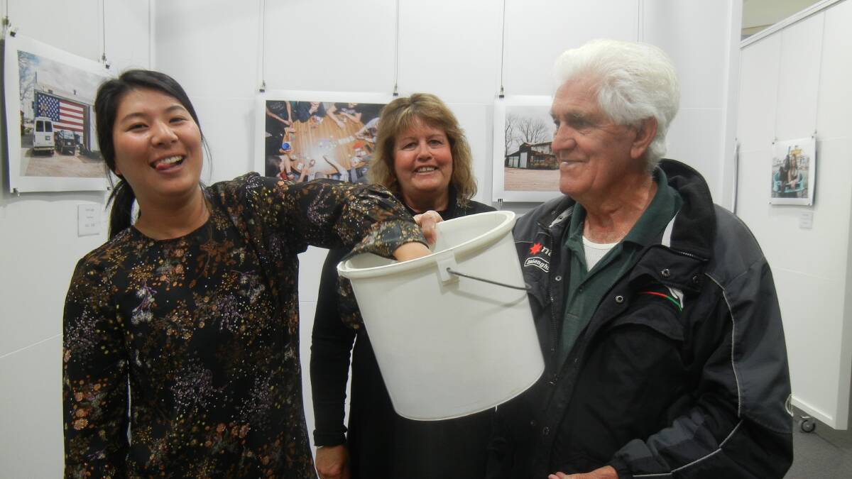 May Suzuki drawing the Lions wood raffle with Cathie Logan and Terry Carroll, Julie Condon was the winner.