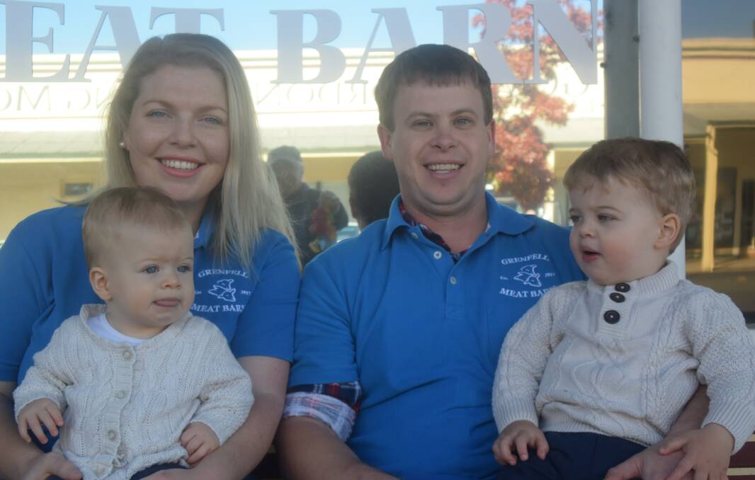 Nev and Emily Essex with their two young sons Max and Eddie outside the Grenfell Meat Barn in Main Street.