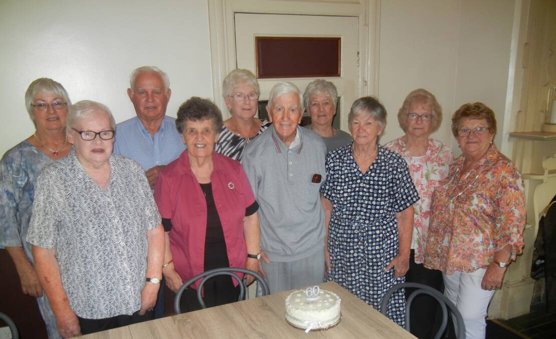 Shirley and Elwyn Turner celebrating their diamond wedding anniversary with family and friends.