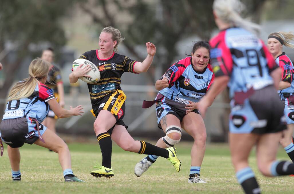 Girlanna Isobel Holz smashes through the Cargo opposition in last weekend's tight game. Photo RS Williams 