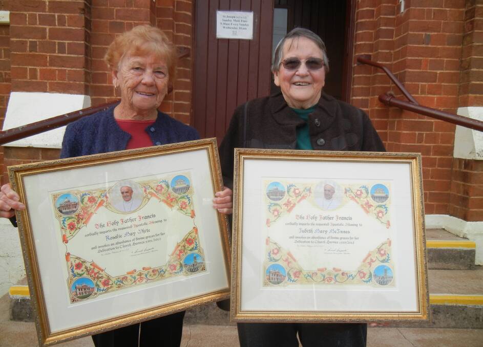 Rosalie White and Judy McInnes with their Papal Blessings. 